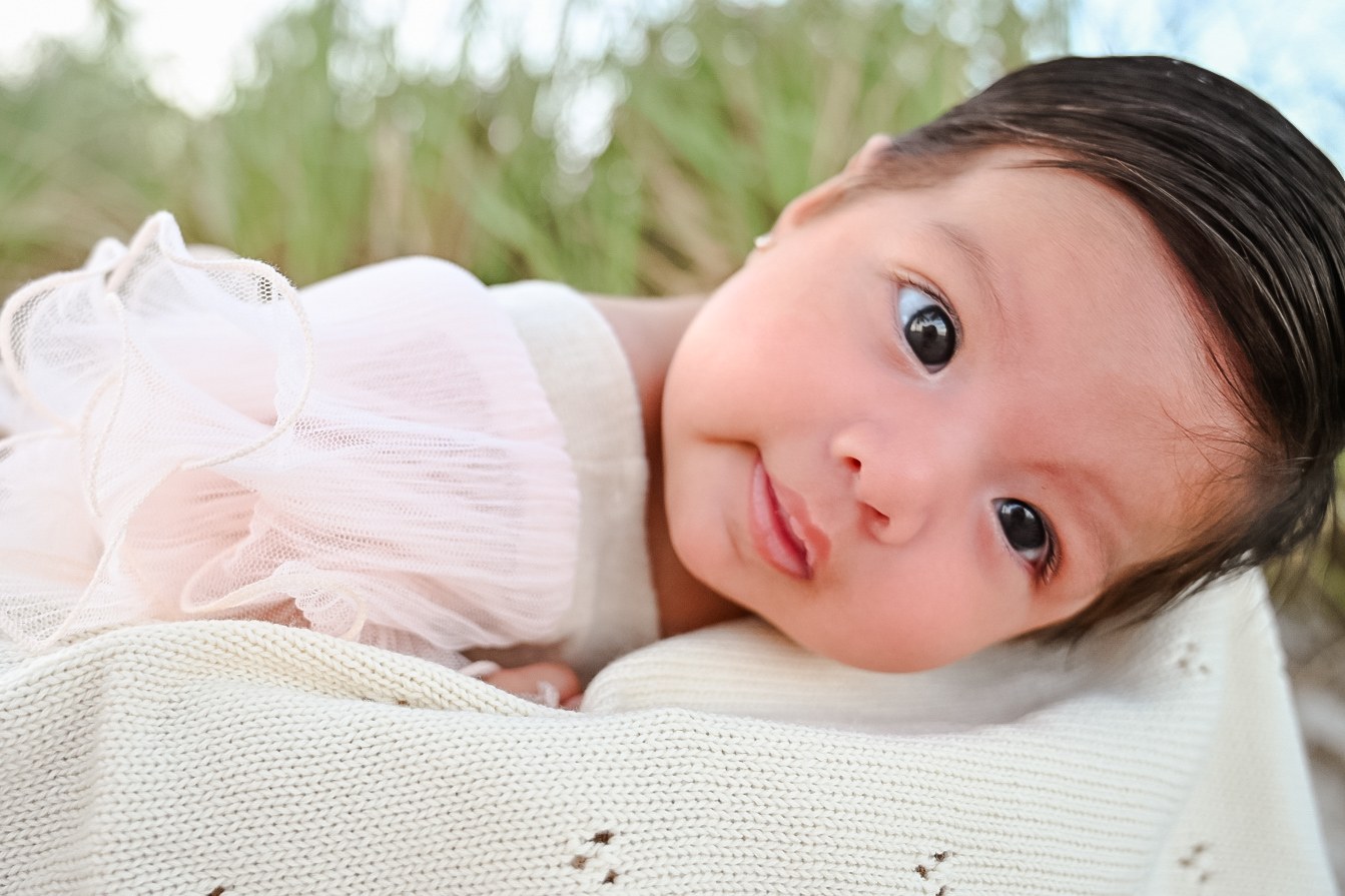 Baby portrait on a cream blanket